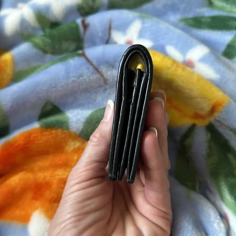 Gucci Black Embossed Leather Bi-Fold Wallet